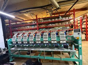 Tajima TFMX C1208 8-head embroidery machine